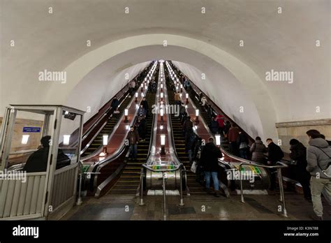 Russia Moscow Komsomolskaya Metro People On The Escalators Stock