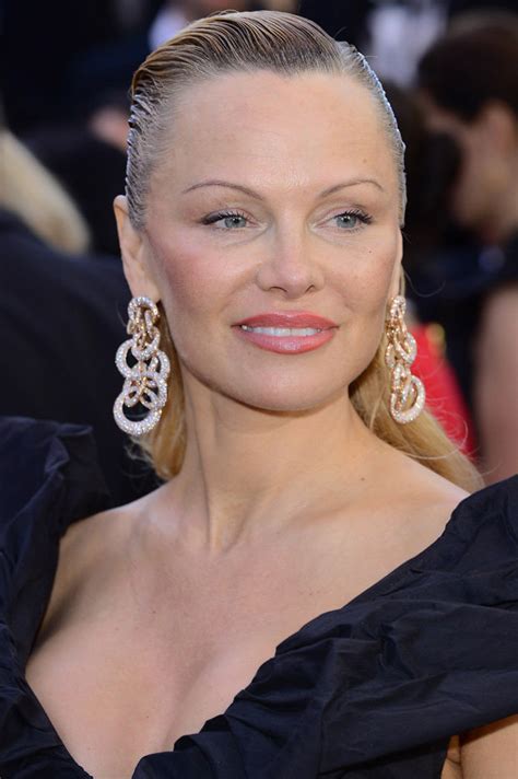 With pamela anderson, tommy lee, mick mars. Pamela Anderson new look: Baywatch star looks ...