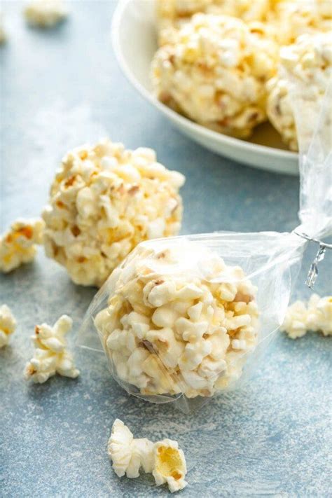 these extra gooey marshmallow popcorn balls are an old fashioned holiday treat made with salty