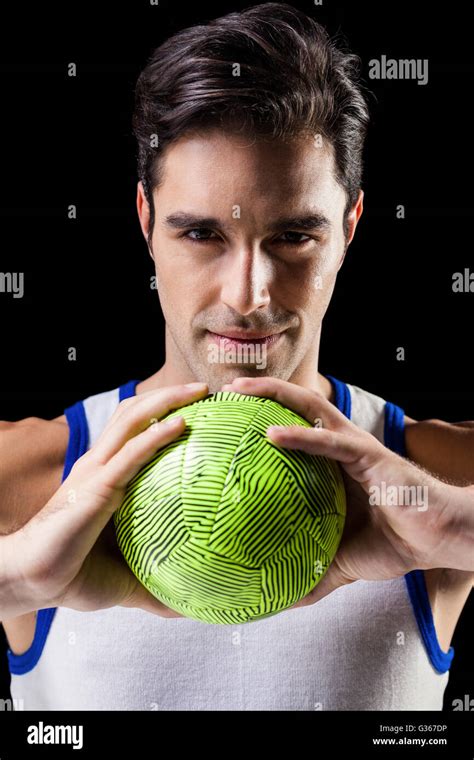 Portrait Of Happy Athlete Man Holding Ball Stock Photo Alamy