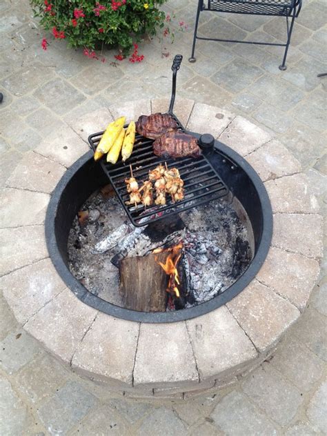 From wood burning fire pits to gas fire pits, we have everything you need to bring style & warmth to your outdoor space. Fire pit cooking, Fire pit grill, Fire pit backyard