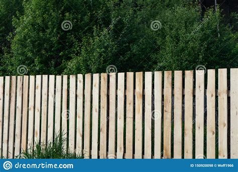 New Wooden Fence High Wooden Fence Of New Boards Stock Photo Image