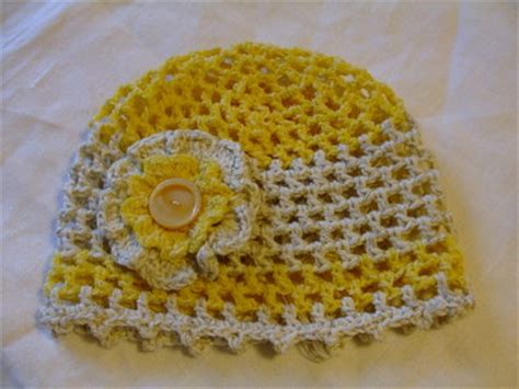 Spedisci fiori a chi ami ovunque esso si trovi! Cuffia baby,giallo-panna,di cotone lavorata all'uncinetto ...