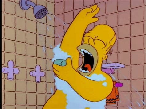 The Simpsons Character Is Taking A Shower With His Mouth Open And Hands In The Air