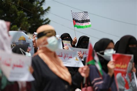 Gaza City Gaza May 10 Gazans Hold Banners And Palestinian Flags During A Demonstration On