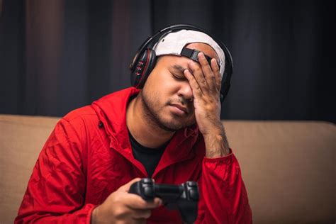 Premium Photo Sadness Gamer Man Holding Joystick He Lose In The Game