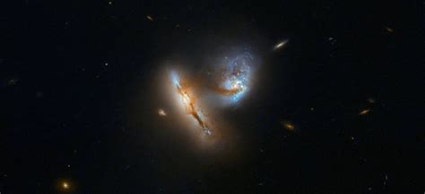 Breathtaking 2 Galaxies Seen Colliding By Nasas Hubble Space