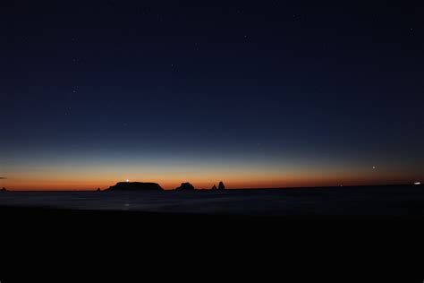 Rock Formation Silhouette Night Stars Sunset Hd Wallpaper