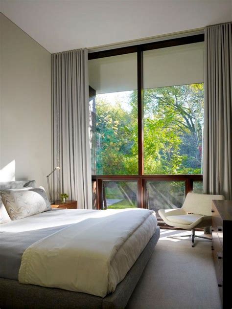 The floor to ceiling curtains make the room look larger and bring a certain elegance to the space. ceiling to floor drapes - Google Search | Bedroom window ...