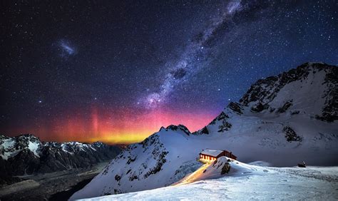 Milky Way Sky Over House In The Snowy Mountains