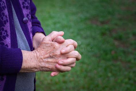 Close Up Of Hands Senior Woman Joined Together For Prayer Concept Of
