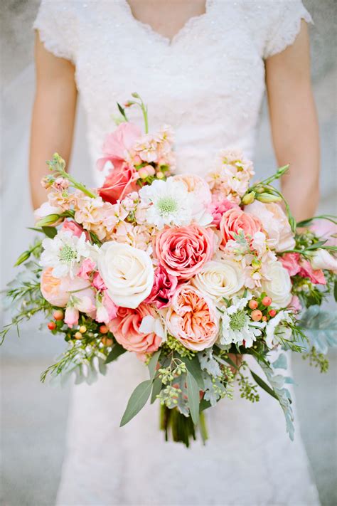 Your bridal flowers are such an important part of your wedding day, so it's important to pick a type of bouquet that will complement your overall look. coral wedding bouquet bushel and a peck floral design ...