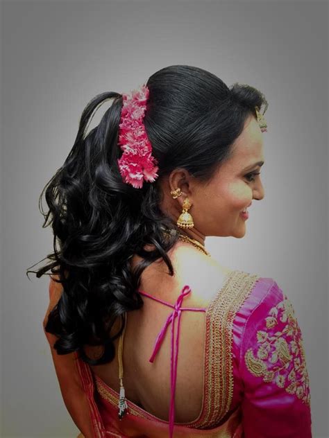 Wedding reception is a very important occasion for a. Indian bride's bridal reception #hairstyle by Swank Studio ...