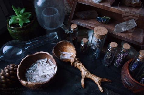 An Assortment Of Herbs And Other Items On A Table