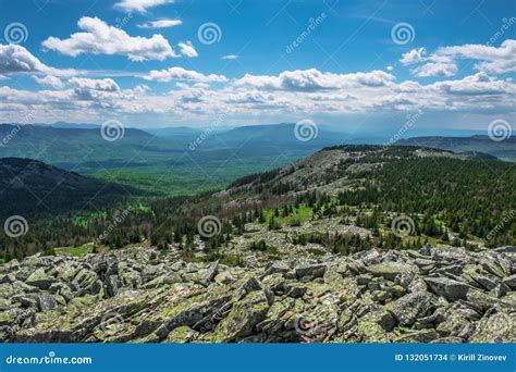 The Rocky Slope And Mountain Valleys On A Cloudy Day Stock Photo