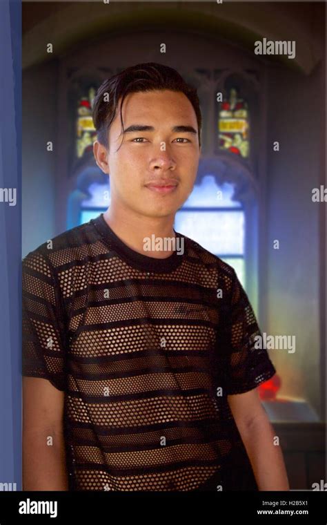 A Young Thai Man Looking At Camerathailand Stock Photo Alamy