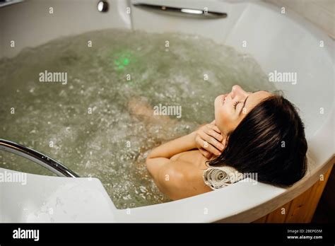 Woman Relaxing At Home In The Hot Tub Bath Ritualspa Day Moment In Modern Bathroom Indoors