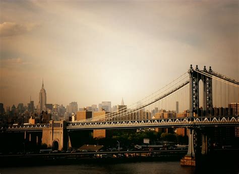 On the manhattan side, the closest train station to the manhattan bridge is the east broadway station. The Manhattan Bridge and the New York City Skyline | Flickr