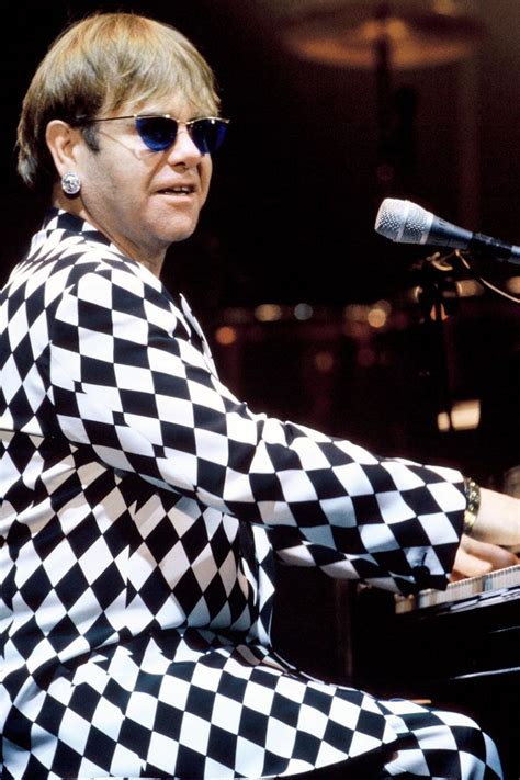 See Photos Of Iconic Elton John Performances And Wild Outfits Over