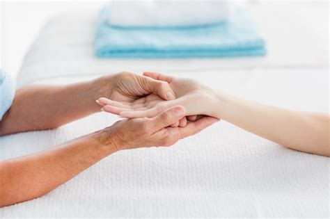 Premium Photo Cropped Woman Receiving Hand Massage
