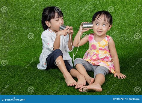 Asian Chinese Kids Playing With Tin Can Phone Stock Image Image Of