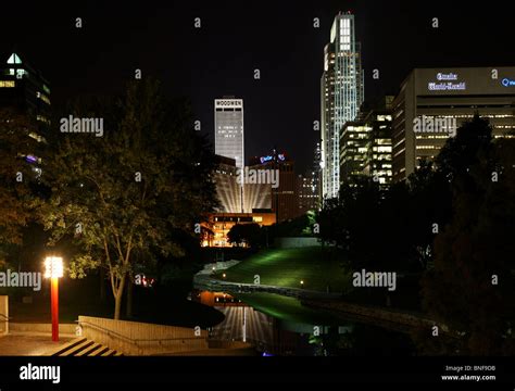 Usa Nebraska Omaha Park At Night With Skyscrapers In Background