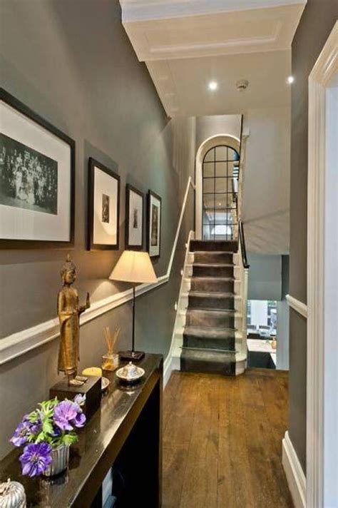 The staircase.for many houses, the staircase is one of the first things you see when you enter your home, so you want to make sure it's beautiful to look at. Small Hallway Decor With Wall Framed Photos And Grey Walls : Small Hallway Decor With Photos ...