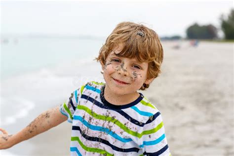 Adorable Active Little Kid Boy Having Fun On Miami Beach Key Biscayne