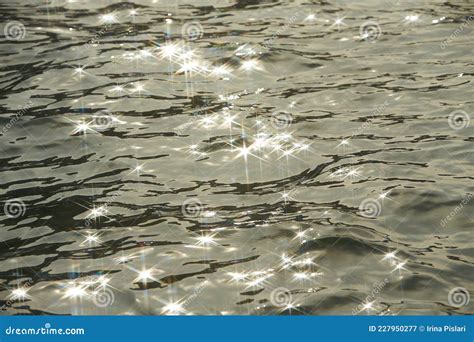 Detail Of A Sunlight Reflecting In Glittering Sea Sparkler In Water