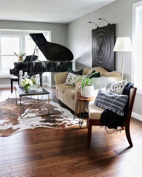 Living Room With Black Grand Piano Faux Cowhide And Large Art Piano