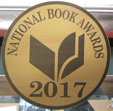 The National Book Awards Logo Is Shown In Black And Gold On A Round
