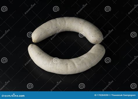 Two Long White Raw Bratwurst Sausage Isolated On Black Background Stock