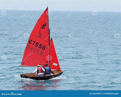 Sailboat With Red Sail On The Ocean Editorial Stock Image Image Of