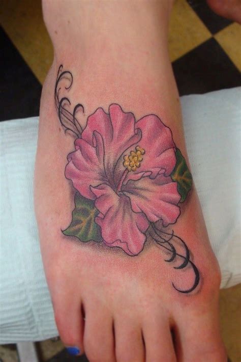 Amazing Pink Colored Hawaiian Flower Tattoo On Foot