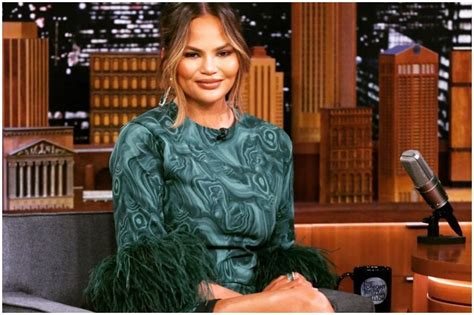 Chrissy Teigen Slams Troll Who Asked Her To Cover Up Her Breasts