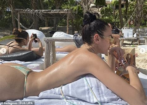 Dua Lipa Flaunts Her Incredible Figure As She Sunbaths Topless In