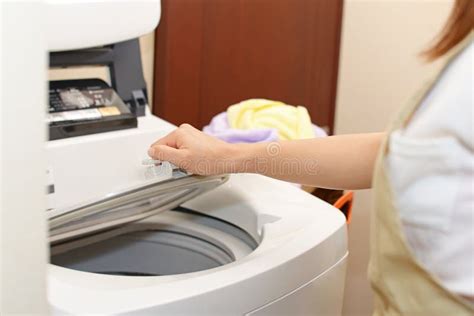 wife using washing machine stock image image of washing 52738391