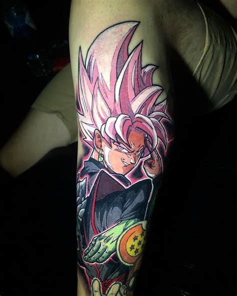 Head on chest, remaining body on shoulder and extended to art. Black Dragon Ball Z Tattoo Ideas - Best Tattoo Ideas