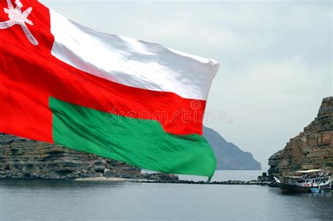 Sultanate Of Oman National Flag With Coastline And Traditional Boat