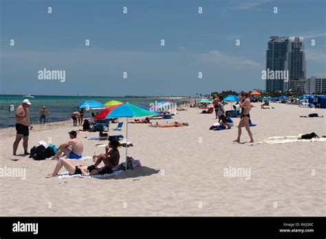 People Relaxing On Holidays In South Beach Miami Beach Florida Usa