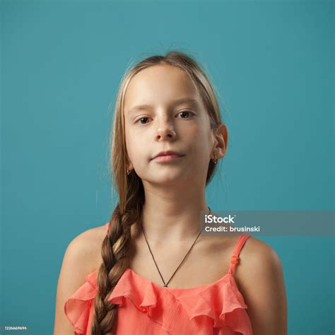 Closeup Studio Portrait Of A 10 Year Old Gir Stock Photo Download