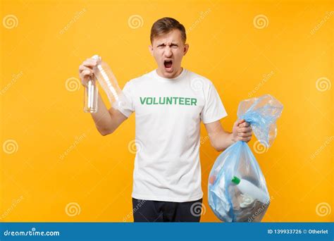 Man In T Shirt Volunteer Trash Bag Isolated On Yellow Background