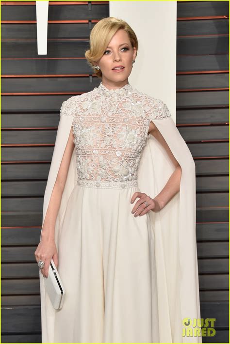 Elizabeth Banks Dons Caped Jumpsuit At Vanity Fair Oscar Party Photo