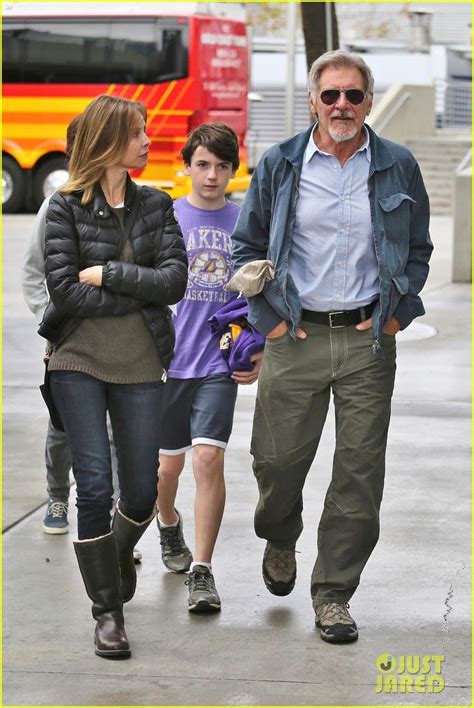 Harrison Ford and Calista Flockhart take their son Liam to a Lakers