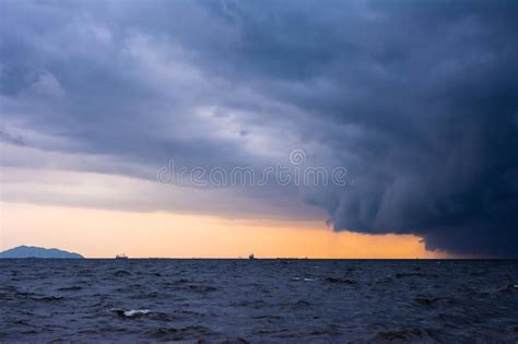 Approaching Storm Cloud With Rain Over The Sea Stock Photo Image Of