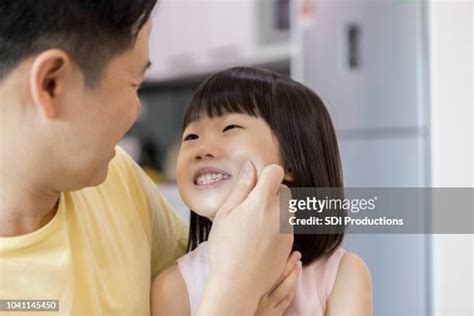 Pinch Cheeks Kid Photos And Premium High Res Pictures Getty Images