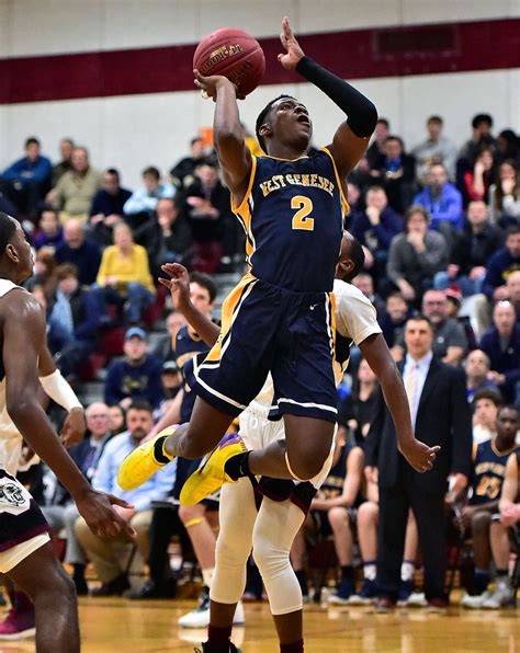 Photos: Corcoran defeats West Genesee boys basketball in overtime (67-64) - syracuse.com