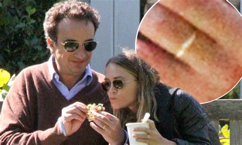 Mary Kate Olsen And Fiancé Olivier Sarkozy Sport Matching Gold Wedding