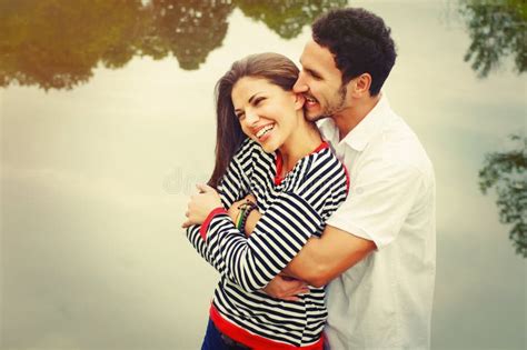 Happy Romantic Wide Smile Couple In Love At The Lake Outdoor On Stock