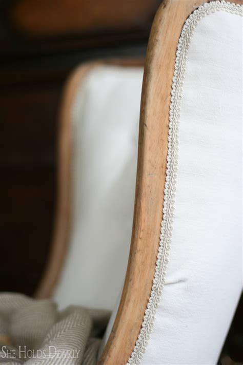 We can reupholster newer that you simply want touched up but we also specialize in reupholstery antique chairs as well. Reupholstering an Antique Chair - She Holds Dearly